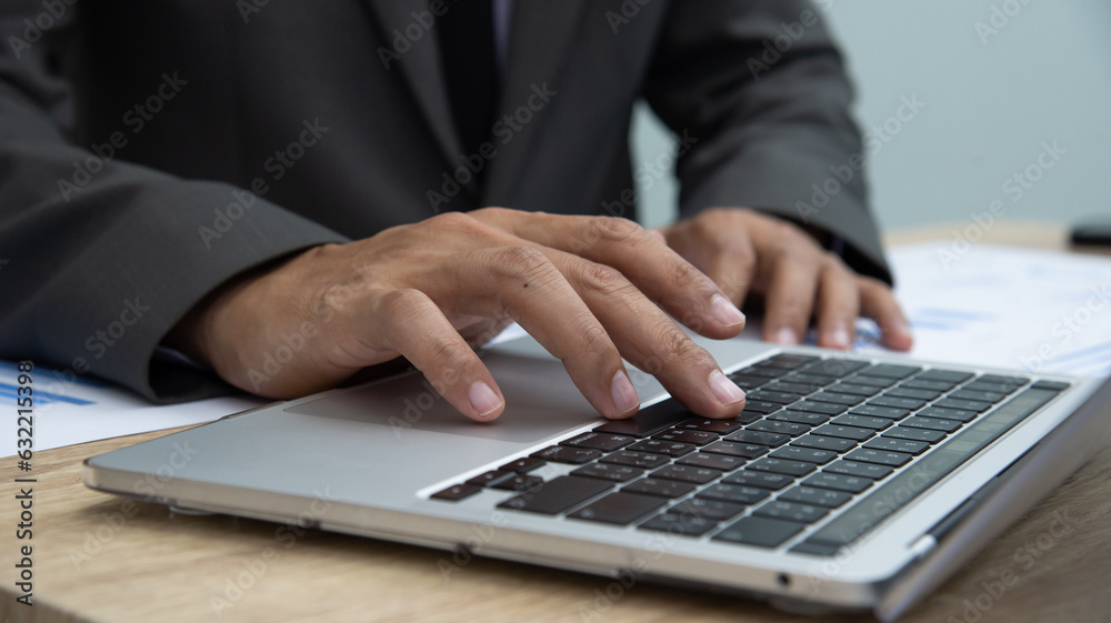 Businessman working at office with digital tablet, laptop computer, smart phone. Professional investor connection internet application online. Businessman review annual company report. Businessman working at office with digital tablet, laptop computer, smart phone. Professional investor connection internet application online. Businessman review annual company report.