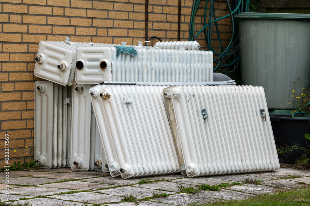 Old radiators after removal during a renovation Stock Photo Adobe Stock