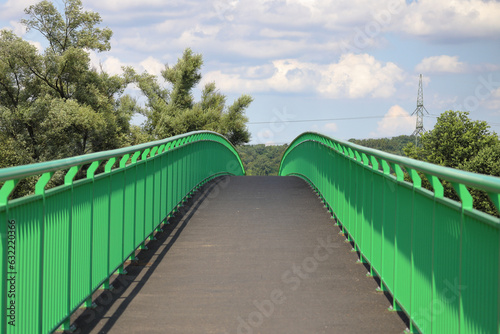 Valokuva Bicycle footbridge over the Skawinka River, the Vistula basin