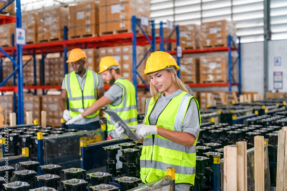 Storehouse workers are checking stock and inventory in retail warehouse. Business factory industry concept. Storehouse workers are checking stock and inventory in retail warehouse. Business factory industry concept.