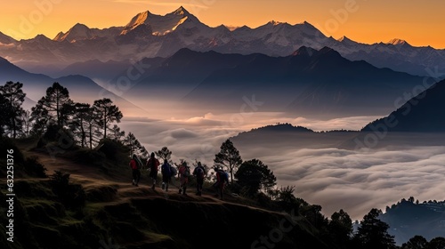 Silhouettes of Himalayas visible through colorful fog on Khalia top trek trail in Uttarakhand India photo