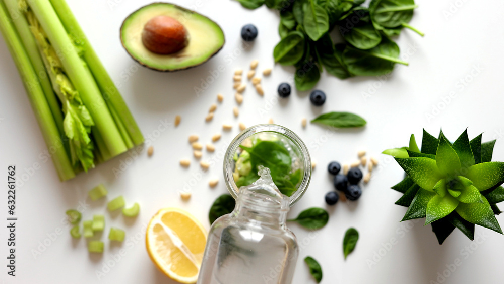 Pouring Organic Freshly Squeezed Green Vegetable and Fruit smoothie Into the jar. Healthy and vegetarian food concept Pouring Organic Freshly Squeezed Green Vegetable and Fruit smoothie Into the jar. Healthy and vegetarian food concept