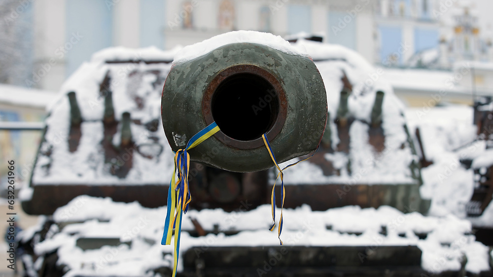 Tank gun, barrel muzzle of a military army close-up. Broken burnt tank. Barrel of a tank gun, selective focus. Destroyed and burned tank, military equipment in the vicinity of Kyiv. War in Ukraine. Tank gun, barrel muzzle of a military army close-up. Broken burnt tank. Barrel of a tank gun, selective focus. Destroyed and burned tank, military equipment in the vicinity of Kyiv. War in Ukraine.