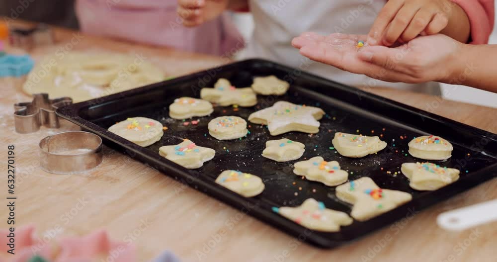 Kitchen hands, cookie or kids decoration, bake or prepare dessert, candy or sweets with rainbow sprinkles. Child development, closeup parent help or young family children learning home cooking skills Kitchen hands, cookie or kids decoration, bake or prepare dessert, candy or sweets with rainbow sprinkles. Child development, closeup parent help or young family children learning home cooking skills