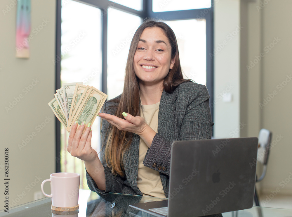 young pretty woman smiling cheerfully, feeling happy and showing a concept. freelance concept young pretty woman smiling cheerfully, feeling happy and showing a concept. freelance concept