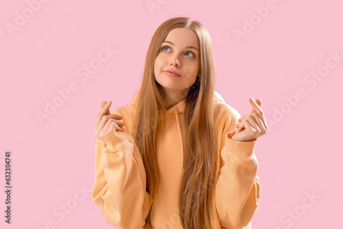 Thoughtful young woman in h...