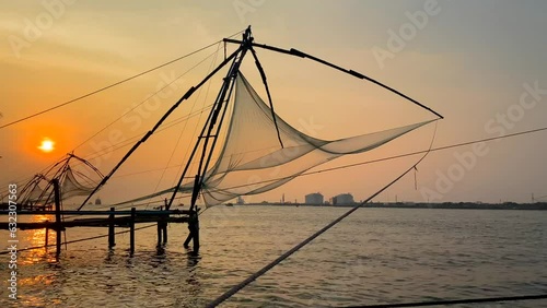 Chinese fishing net at sunrise in Cochin, Kerala, India. Famous landmark in Fort Kochi