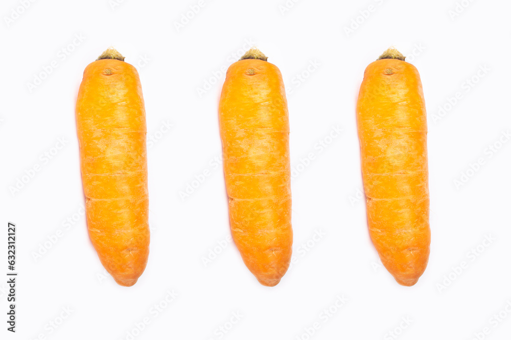 three fresh carrots isolated on white background three fresh carrots isolated on white background