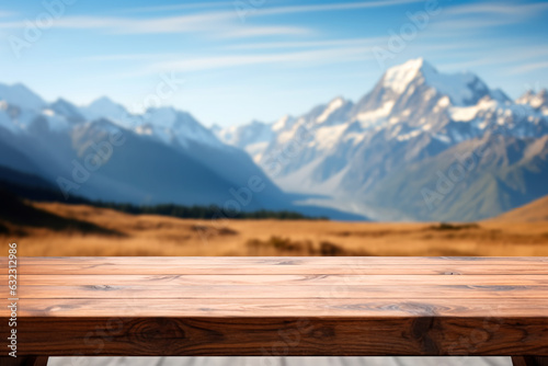 The empty wooden table top with blur background of mountains. AI generated. © Uliana