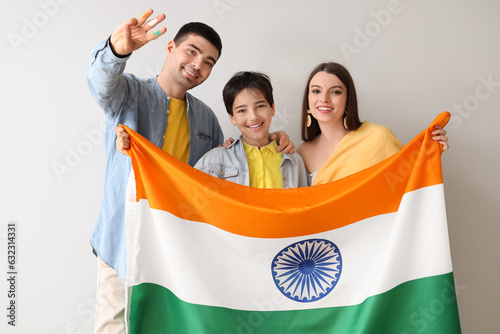 Happy family with Indian fl...