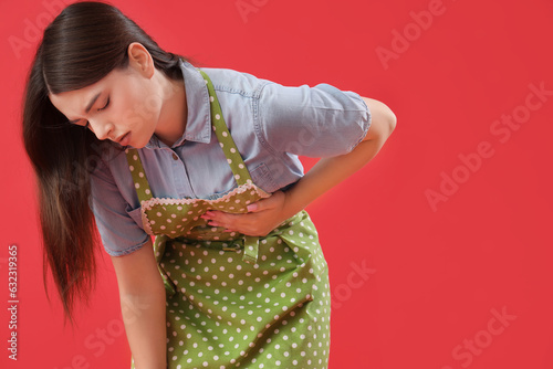 Young housewife having hear...