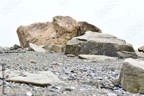 Rock on the shore or coastline of the St. Lawrence River in Rimouski, Quebec, Canada © Slizo