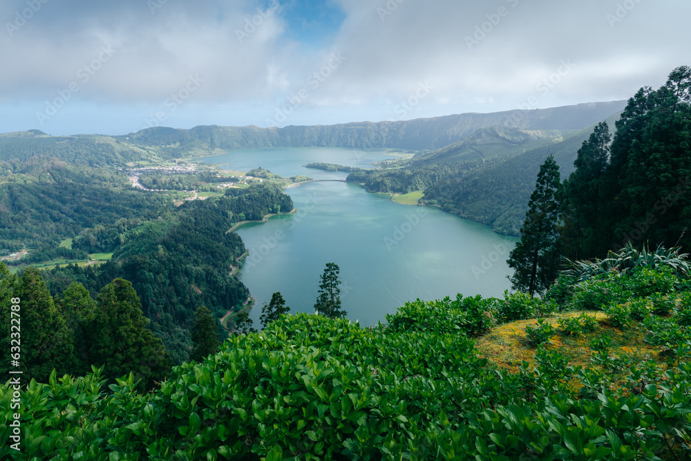 Sete Cidades: Discover the enchantment of Azores, Portugal, as this captivating town unveils breathtaking landscapes and the iconic twin lakes. High quality photo