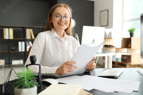 Young businesswoman working...