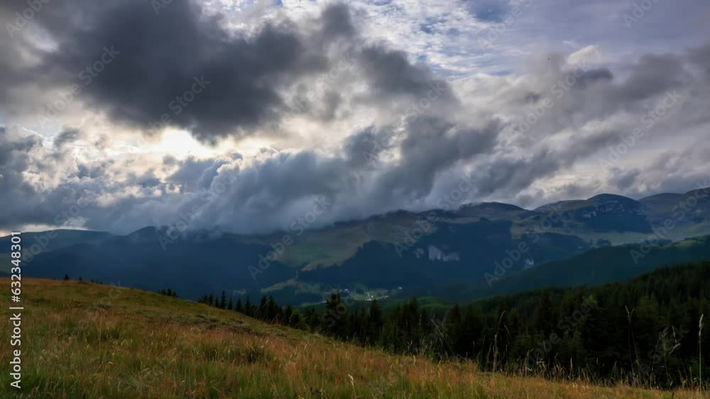Time lapse of moving clouds in the mountain environment over Carpathian mountains. Time lapse of sun rays shinning trough dense moving clouds. Time lapse of moving clouds in the mountain environment over Carpathian mountains. Time lapse of sun rays shinning trough dense moving clouds.