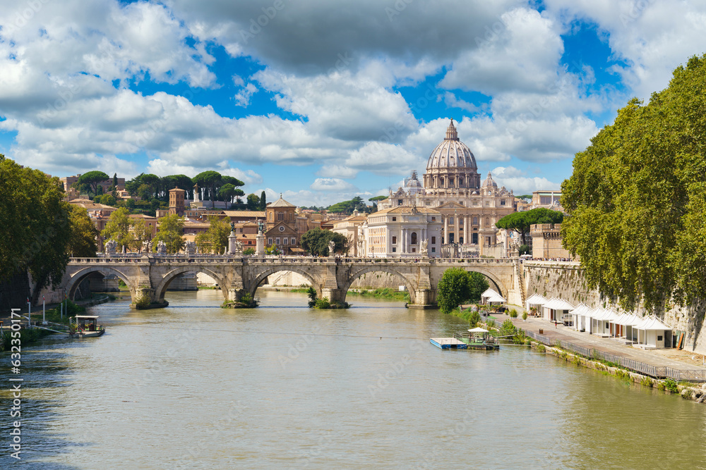 St.Peter's basilica viewed across Tiber river in Vatican, Rome. Italy