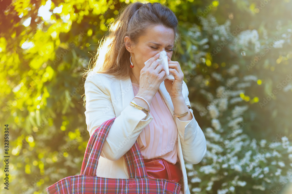 stylish woman in dress and jacket in city has allergy attack stylish woman in dress and jacket in city has allergy attack