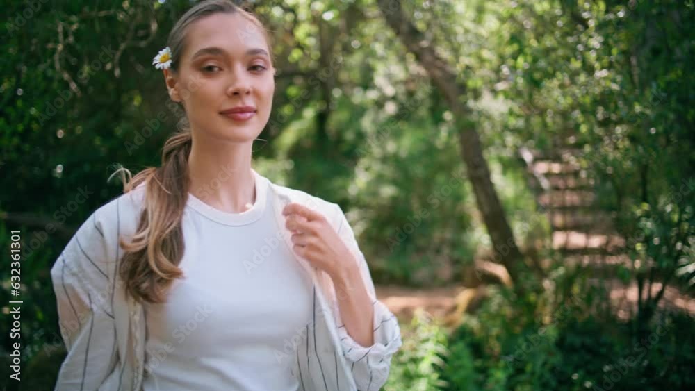 Beautiful model walking forest smiling gently closeup. Cute woman strolling park