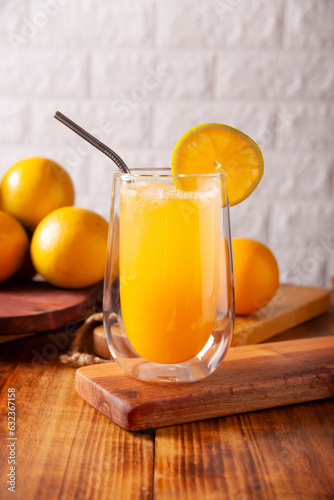 Slika na platnu Refreshing homemade orangeade, a natural hydrating drink made from orange juice, very popular in several countries, ideal to drink in hot summers