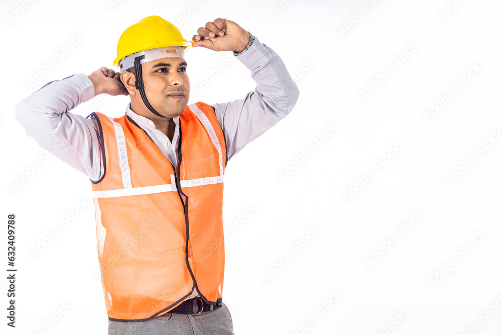 Confident indian engineer standing on white background. Confident indian engineer standing on white background.