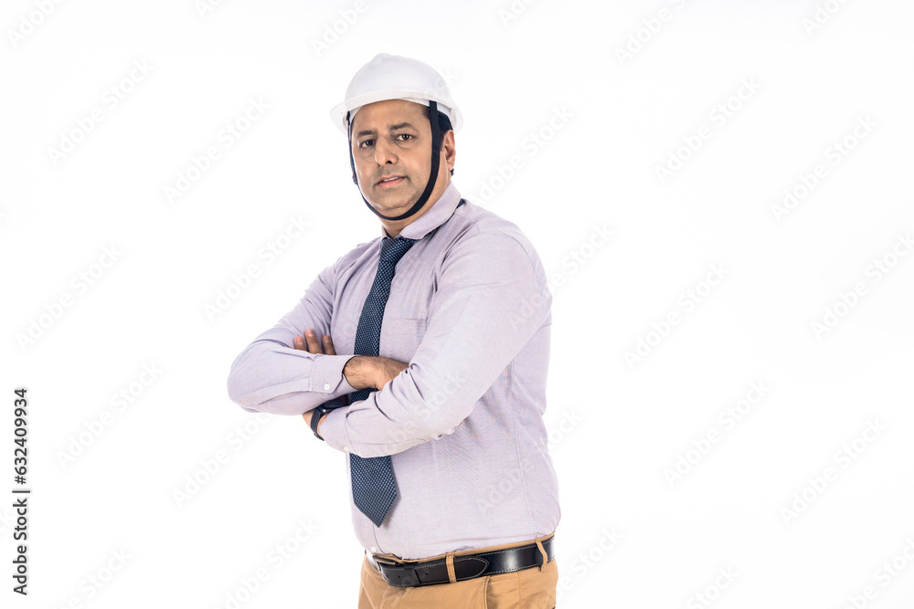 Confident indian engineer standing on white background. Confident indian engineer standing on white background.