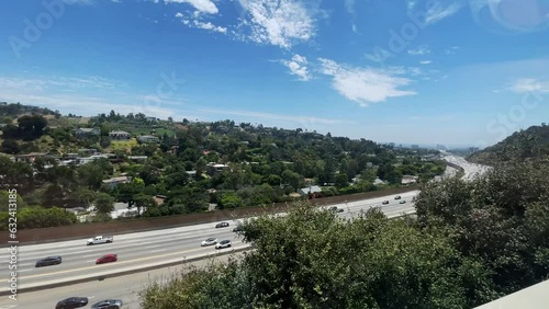 Incredible panning right view of the Interstate 405 from the moving tram Getty Center in Los Angeles Southern California. photo