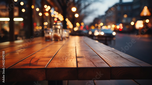 The surface of a wooden table in a cafe restaurant outdoors on a terrace with a blurred background and glowing bokeh lights. AI generated