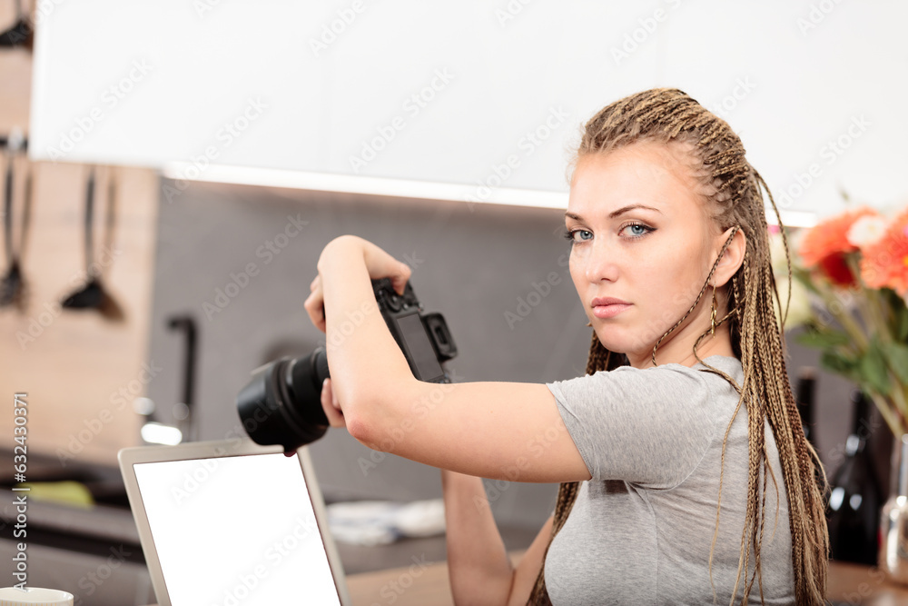 Woman tests DSLR, kitchen, merging technique, creativity Woman tests DSLR, kitchen, merging technique, creativity