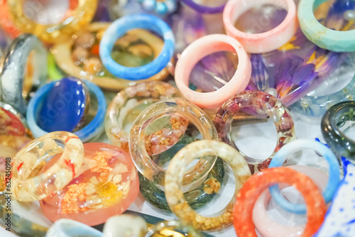 Jewelry, epoxy resin rings. Colorful fashion jewelry photo