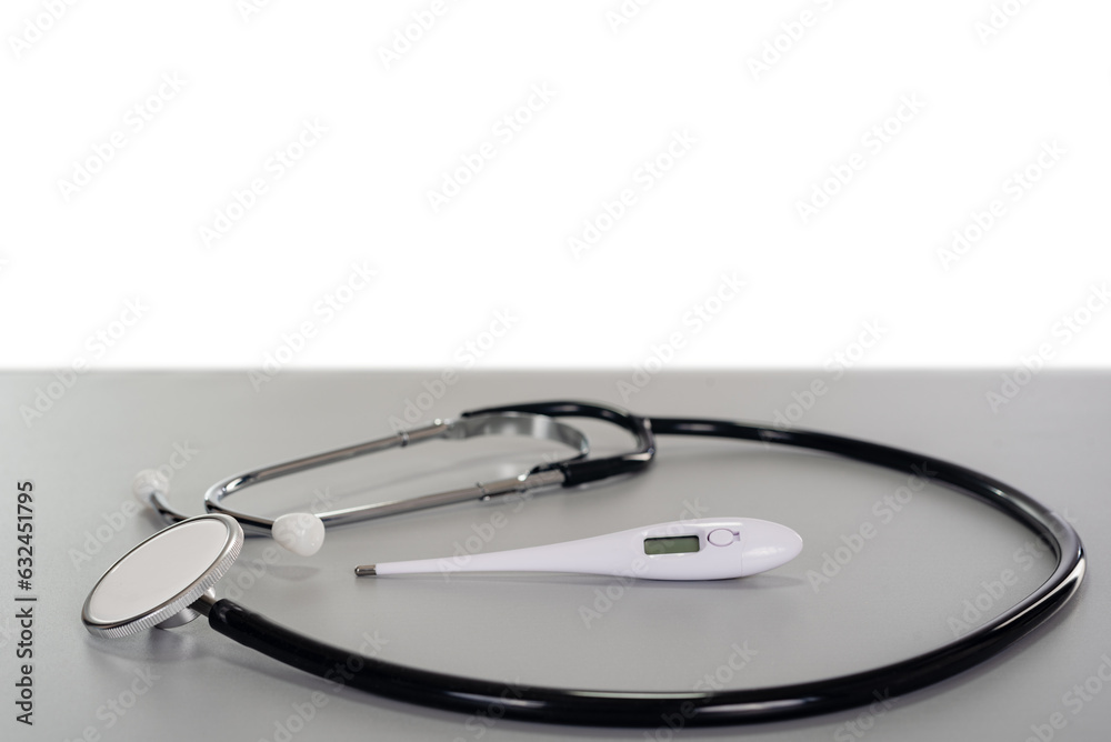 stethoscope envelope white modern thermometer on gray table with copy space background stethoscope envelope white modern thermometer on gray table with copy space background