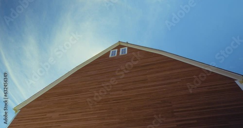 Triangular Red Barn of Hovander Park Vibrant Day under Wispy Blue Skies, Ferndale, WA photo