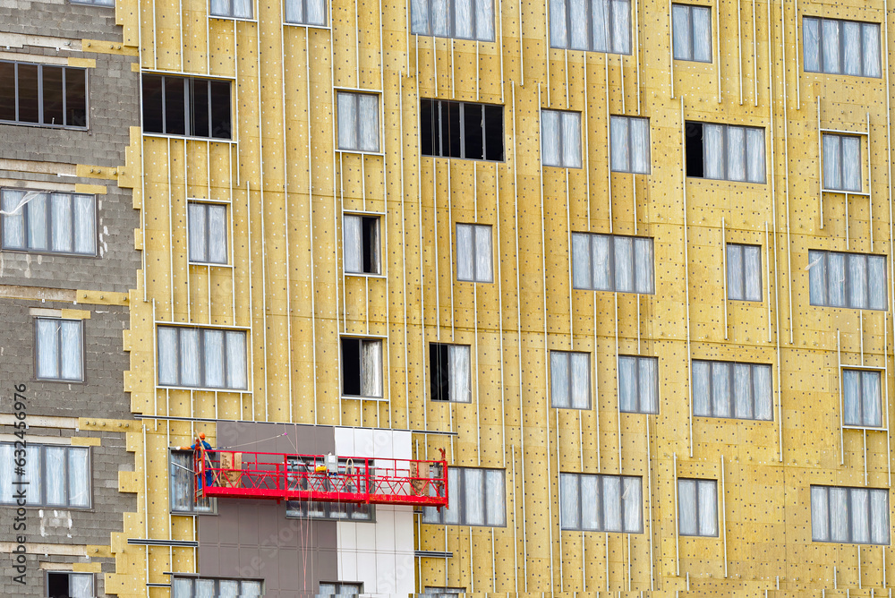 External wall thermal insulation with mineral wool. Passive heat