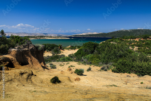 Fototapeta Naklejka Na Ścianę i Meble -  Sand dunes wild green vegetation beaches in Croatia on the island of Rab