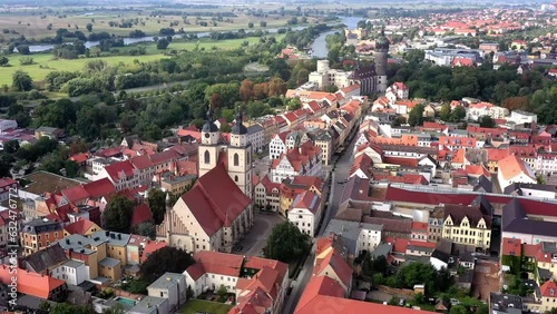 Drone shot, drone video, drone flight, aerial view, flight over the historic old town with half-timbered houses, St. Marien zu Wittenberg city church and castle church, Elbe, Luther city Wittenberg