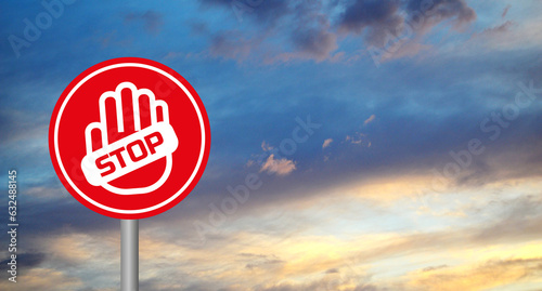 stop sign on a cloudy sky