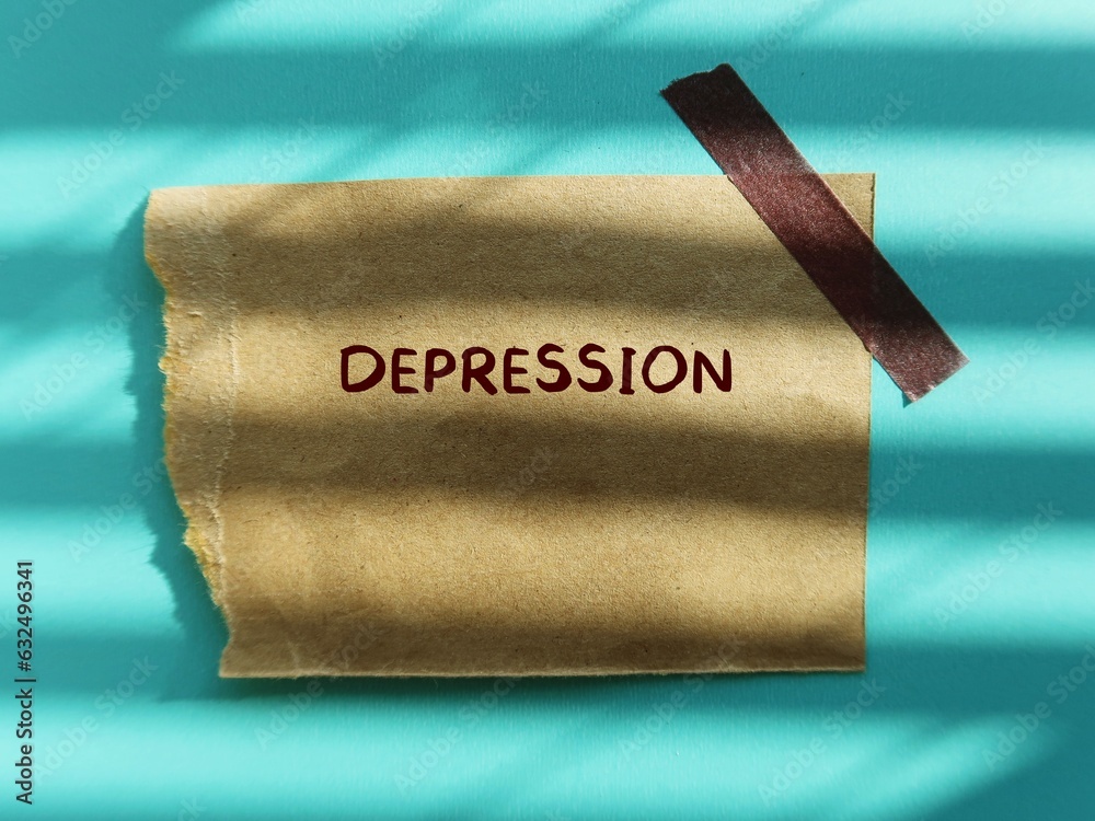 On blue background, torn brown paper with handwritten text DEPRESSION ...