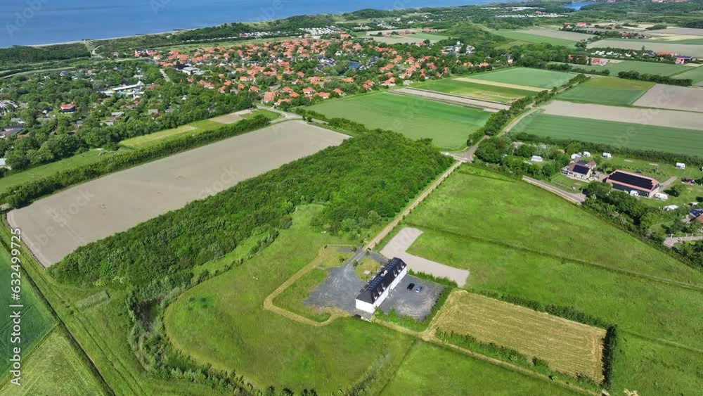 Aerial View Of Green Meadow, Fields Near The Zoutelande Village On A Sunny Day In Netherlands. Aerial View Of Green Meadow, Fields Near The Zoutelande Village On A Sunny Day In Netherlands.