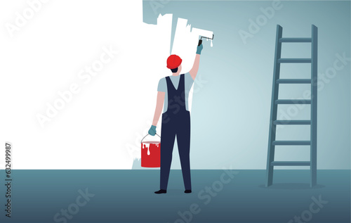 Professional painters painting a wall