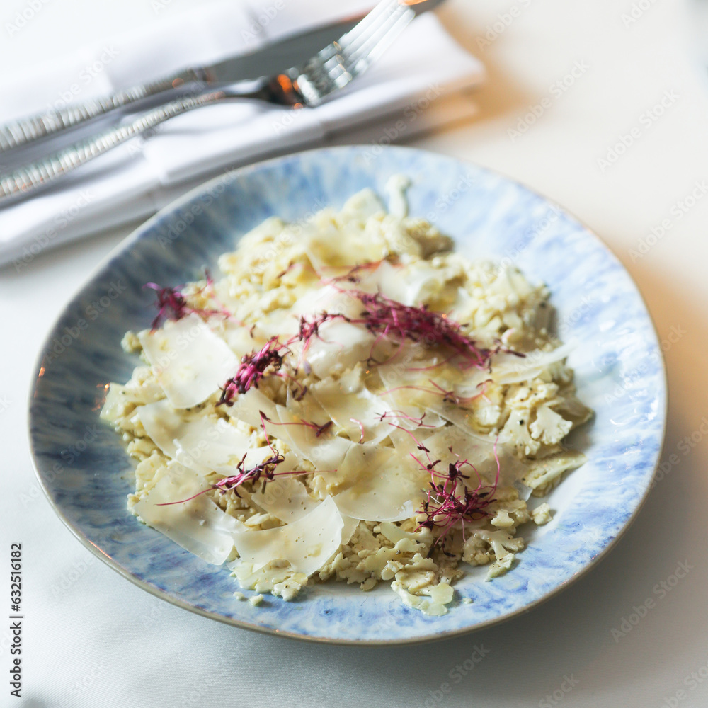 Healthy cauliflower carpaccio with cheese Healthy cauliflower carpaccio with cheese