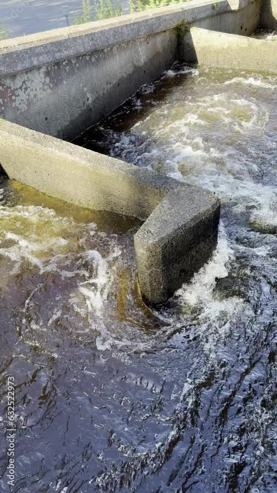 custom made wallpaper toronto digitalOulu, Finland – 08/06/2023:water running in the fishway, vertical