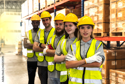 Photogroup of diversity warehouse workers standing armcrossed in distribution warehouse
