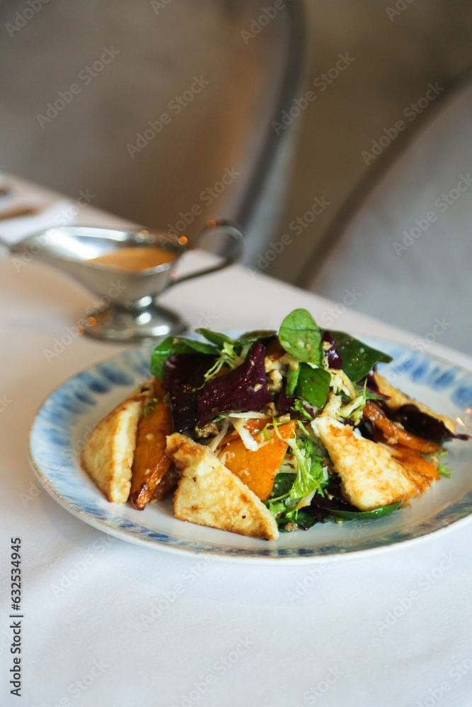 Spinach salad with roasted pumpkin and cheese Spinach salad with roasted pumpkin and cheese