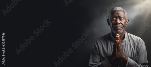 An elderly man of African ethnicity praying. Christian religious prayer and devotion banner with copy space. Generative AI illustration