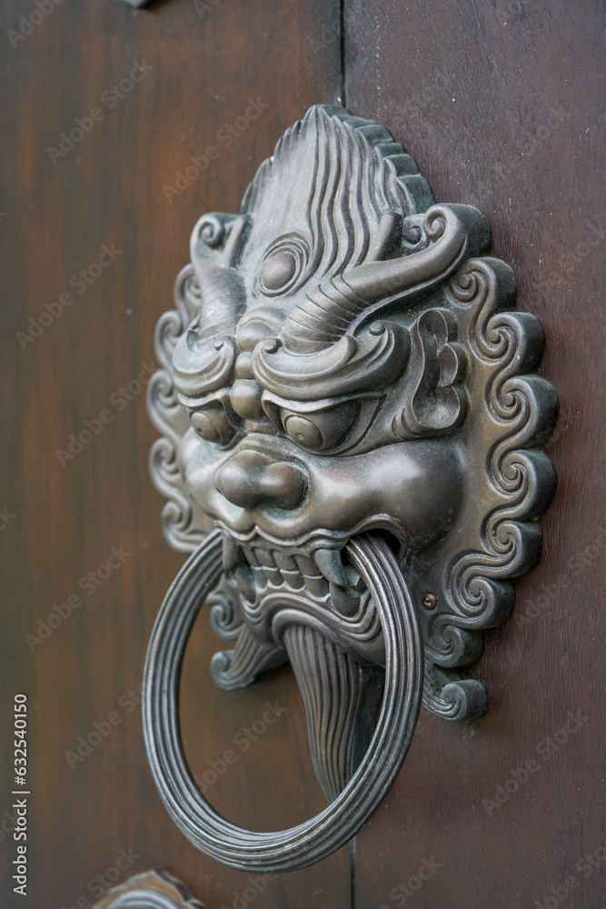 Timber structure Japanese style Tang style architectural temple and wooden door at Tsz Shan Temple in Hong Kong Timber structure Japanese style Tang style architectural temple and wooden door at Tsz Shan Temple in Hong Kong