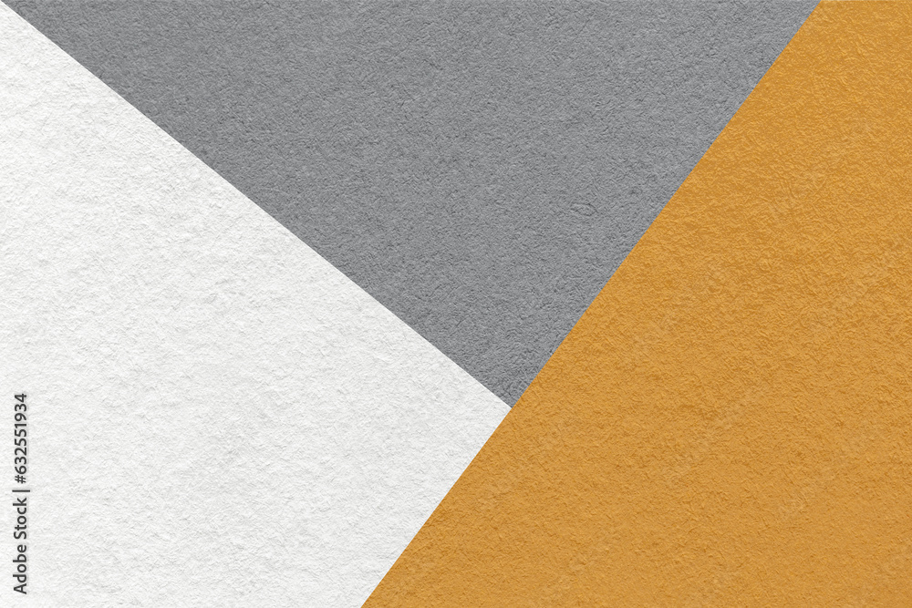 Texture of craft white, gray and dark orange shade color paper background, macro. Vintage abstract cardboard Texture of craft white, gray and dark orange shade color paper background, macro. Vintage abstract cardboard