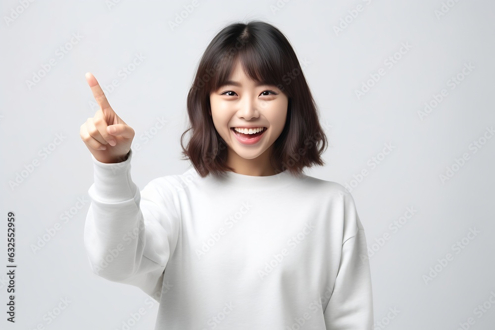 Generative AI : Young attractive asian woman pointing up to side for showing message feeling happy amazed at cafe coffee shop background with copyspace Blogger entrepreneur customer or social influenc