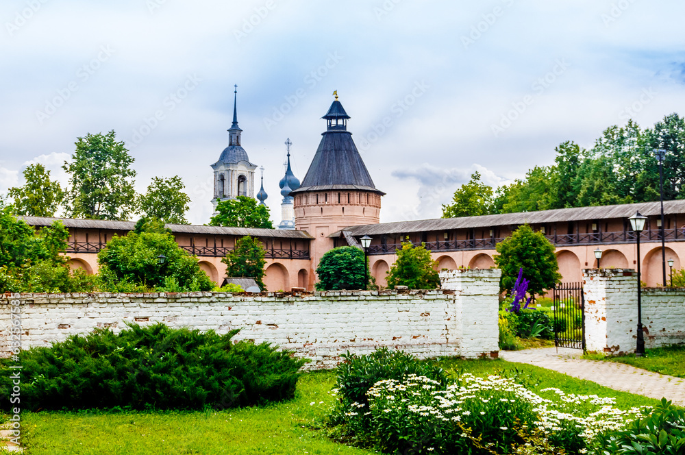 Suzdal, Vladimir Oblast, Russia - 5 July 2023: Defensive towers and walls in the apothecary's garden шт Spaso-Evfimiev (Saint Euthymius) Monastery in Suzdal.