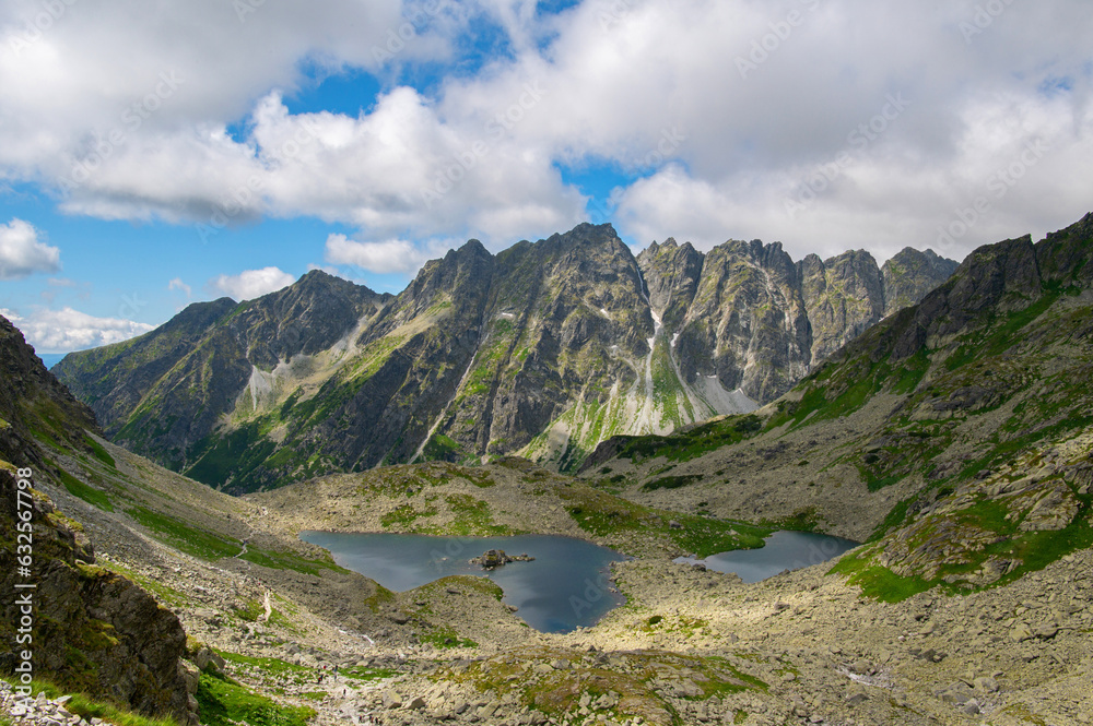 View from the mountain Rysy of Veľké Žabie pleso and Malé Žabie pleso lakes. High Tatras. Border of Poland and Slovakia. Hiking in Slovakia. Beautiful landscape of mountain tops and the lakes.