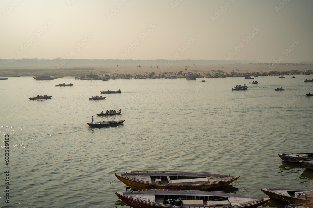 Varanasi India - March 12 2023  Ganga river view and sailing boats from Dashashvamedh Ghat, Varanasi, India