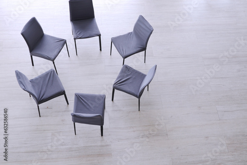 Chairs in a circle with copy space to use text for meeting concept, psychology consultation concept or project presentation